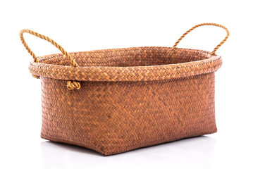 Empty wicker basket on white background