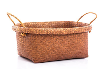 Empty wicker basket on white background