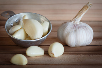 Garlic on wood background