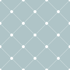 Geometric repeating ornament with diagonal white dots. Seamless abstract modern pattern