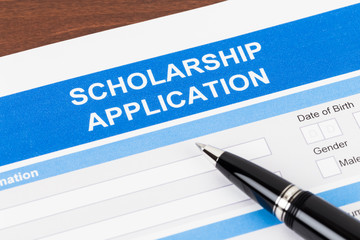 Scholarship application form with pen