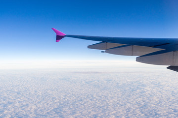 view of planet earth from an airplane through the window