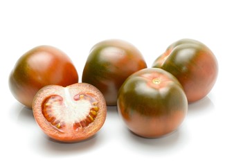 kumato tomatoes isolated on white background