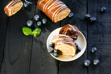 Slices of Swiss roll and blueberry