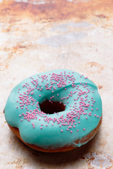 donut with turquoise frosting