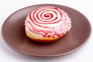 donut on brown plate