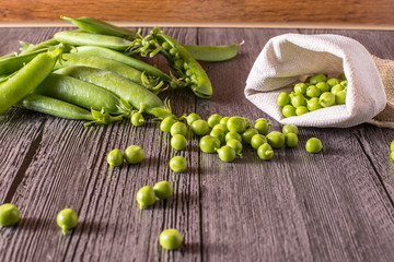 peas on a wood table