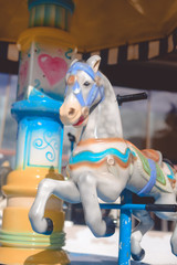 Fototapeta na wymiar Horse carousel carnival - vintage effect style pictures