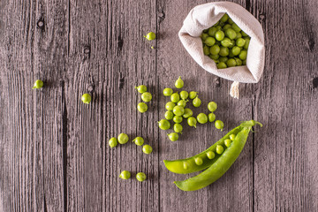 peas on a wood table