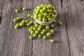 peas on a wood table