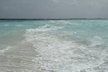 Fototapeta na wymiar waves on the sea in the Maldives