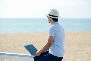 Side view of businessman enjoying working outside talking on phone