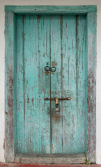 Rustic antique wooden door. Architectural element. Material construction.
