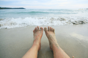 Sandy Woman Feet on the beach,Thailand