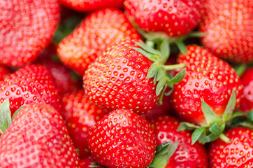 Ripe strawberries as a background.