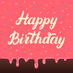 Happy birthday hand lettering on cake glaze background.
