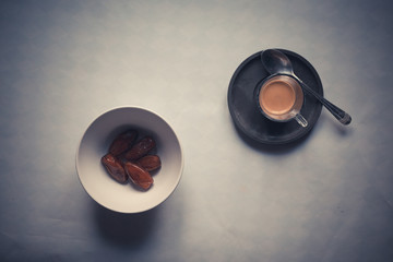 italian espresso coffee and dates for breakfast,overhead sight