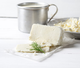 homemade  cheese,milk and cottage cheese on a wooden background.rustic style