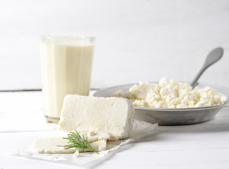 homemade  cheese,milk and cottage cheese on a wooden background.rustic style