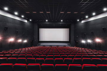 Empty rows of red theater or movie seats. Chairs in cinema hall. Comfortable armchair - obrazy, fototapety, plakaty