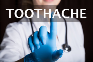 technology, internet and networking in medicine concept - medical doctor presses toothache button...