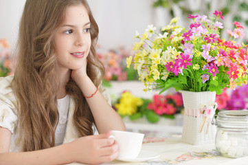 little girl drinking tea