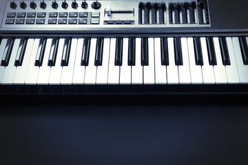 Fototapeta premium Keyboard of synthesizer closeup