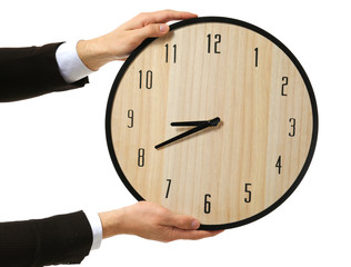 Male hands holding  big clock on white background
