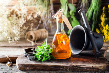 Therapeutic tincture in bottles made of honey and mint leaf