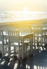 white chair and table on the beach
