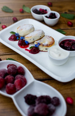 Cottage cheese pancakes, Fritters of cottage cheese. traditional Ukrainian and Russian cuisine