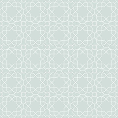 Seamless vector ornament. Modern geometric pattern with repeating elements. Light blue and white pattern