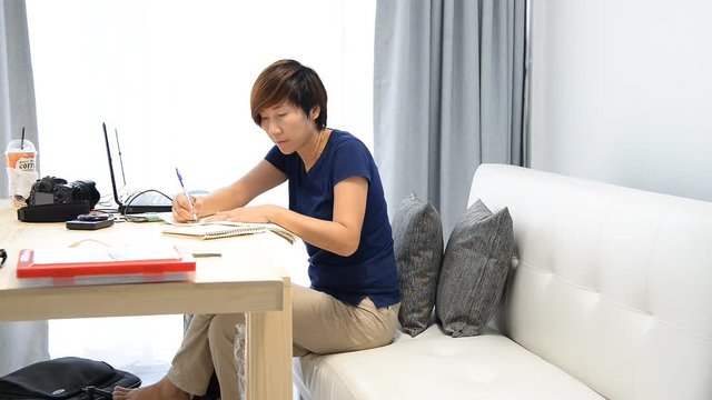 Female small business owner working from home