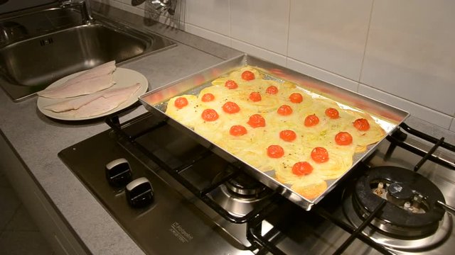 206 - fillet of sea bass and potatoes with tomatoes