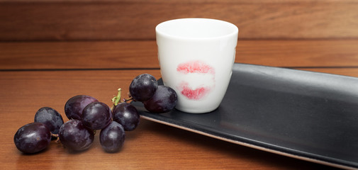 Coffee cup with red lipstick