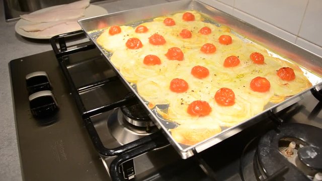 207 - fillet of sea bass and potatoes with tomatoes