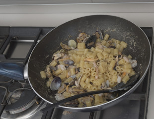 Pasta with seafood. Ingredients ad procedure. Italian cusine. Italian Style