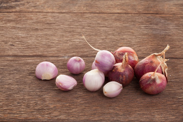 Shallots on a wooden floor