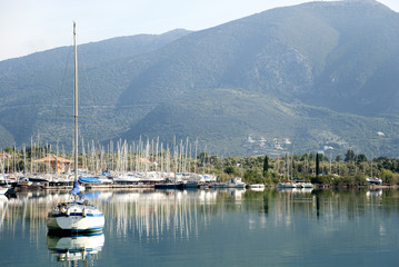Fototapeta na wymiar Greece. Parking of yachts in a bay on the island of Corfu.