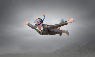 Businesswoman diver in free fall