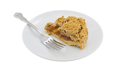 Slice of Dutch apple pie on a plate with a fork isolated on a white background.