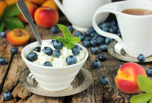 Cottage cheese with berries, fresh berries and fruits for breakf