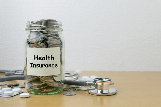 Money saving for health Insurance in the glass bottle