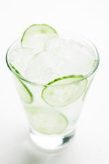 Drink with cucumber on the white background 