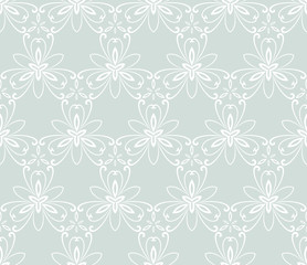 Floral vector ornament. Seamless abstract classic pattern with flowers. Light blue and white pattern