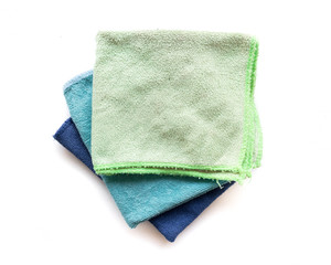 Pile of microfiber cloth for clean on white background, workhouse concept