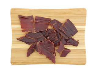 Hardwood smoked beef jerky on a cutting board