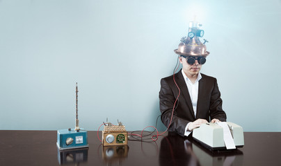 Vintage businessman sitting at office desk
