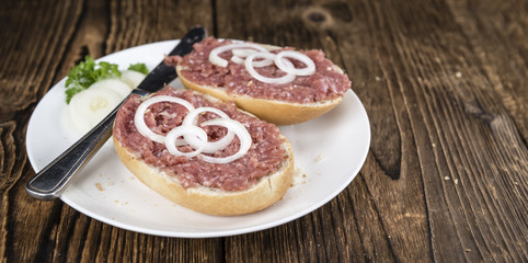 Bun with Mett (German cuisine; selective focus)