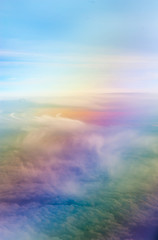 Rainbow sky with clouds aerial view